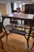 A late 19th or early 20th Century mahogany occasional table having shaped legs and galleried