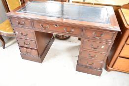 A reproduction Regency mahogany pedestal desk, width approx. 120cm