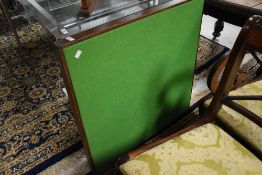 A traditional folding card table