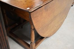 A traditional oak gateleg table in the 19th Century style, width approx. 148 x 196cm