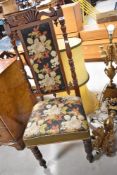 A 19th Century mahogany framed hall chair , having woolwork seat and back panel
