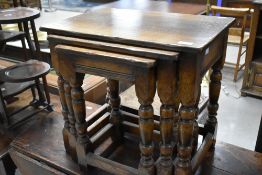 A nest of three oak tables, Titchmarsh and Goodwin or similar