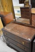 An early to mid 20th Century oak ply bedroom chest and dressing table