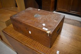 A 19th Century oak stationery box having campaign style handles and blank cartouche space, approx