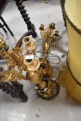 A pair of French baroque style elaborate table lamps, height to fitting approx. 66cm (af, foot