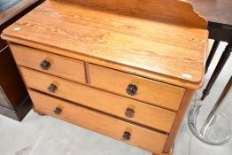 A Victorian pitch pine chest of two over two drawers, width approx. 107cm