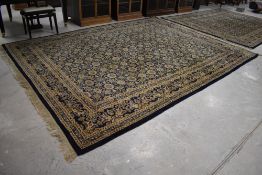 A traditional Indian Kaimuri wool carpet square, hand made by E Hill & Co, Mirzapur, approx. 370 x