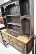 A 19th Century Jacobean style oak dresser, width approx. 137cm