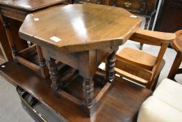 A period style oak occasional table having octagonal top, diameter approx. 49cm