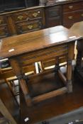 A period style oak coffin stool style occasional table
