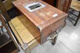 A vintage wooden shop till