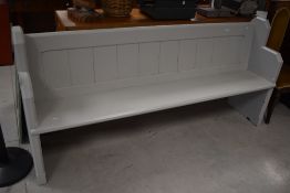 A traditional church pew, with book rail to back, painted in light grey , width approx. 195cm