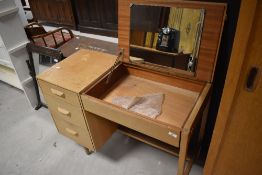 A mid Century golden oak dressing table having internal mirror, in the Gomme G plan style, width