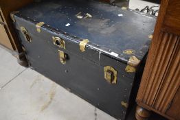 A vintage luggage trunk, labelled for L Mc Brine Co Ltd, Kitchener Canada, approx. dimensions W92