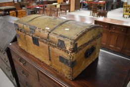 A 19th Century hide storage trunk having domed top, width approx. 76cm