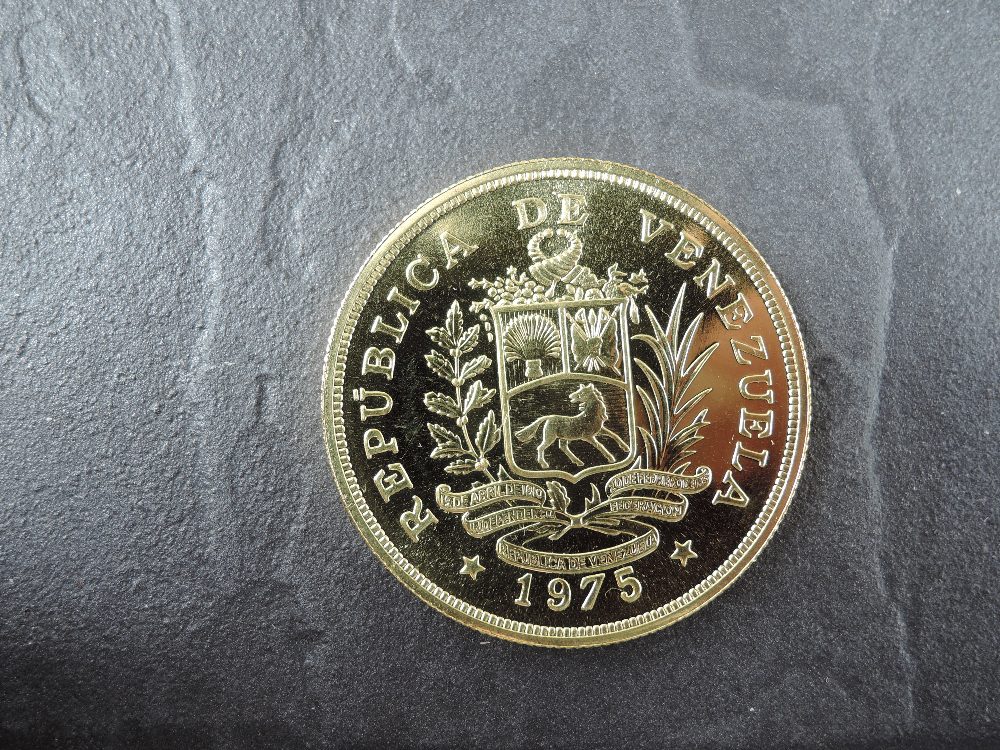 A 1975 Republica De Venezuela 1000 Bolivares Gold Coin, Bird on branch to reverse, Uncirculated in