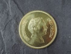 A 1977 Jordan 50 Dinars Gold Coin, Houbara Bustard to reverse, Uncirculated in plastic capsule, no