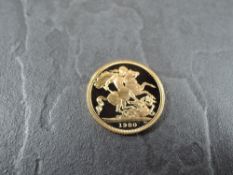 A Royal Mint 1980 Queen Elizabeth II Gold Proof Sovereign, George & Dragon, in capsule and in fitted