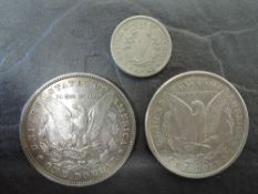 Three USA Silver Coins, 1880 Morgan Dolar win San Francisco Mint Mark, 1921 Morgan Dollar and 1883