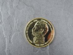 A 1978 Columbia 15000 Pesos Gold Coin, Ocelot near a body of water to reverse, Uncirculated in