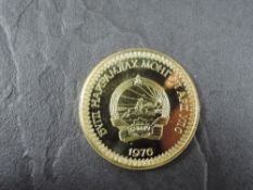 A 1976 Mongolia 750 Togrog Gold Coin, Przewalski Horses to reverse, Uncirculated in plastic