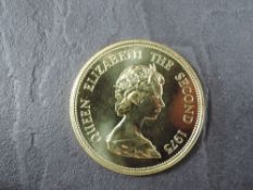 A 1975 Mauritius 1000 Rupees Gold Coin, Mauritius Fly-Catcher with nest on branch to reverse,