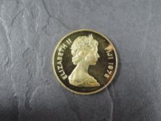 A 1978 Fiji 250 Dollars Gold Coin, Banded Iguana to reverse, Uncirculated in plastic capsule and