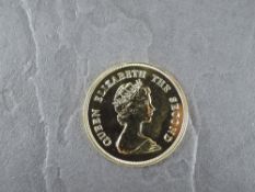 A 1979 Falkland Islands £150 Gold Coin, Southern Sea Lion to reverse, Uncirculated in plastic