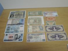 A collection of used World Banknotes including 1931 Swiss 100 Francs, 1970 Yugoslavia 500 Dinara x3,