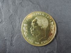 A 1974 Tanzania 1500 Shilingi Gold Coin, Cheetah with Cubs to reverse, Uncirculated in plastic