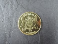 A 1978 Botswana 150 Pula Gold Coin, Brown Hyena to reverse, Uncirculated in plastic capsule and