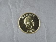 A 1979 Zambia 250 Kwacha Gold Coin, African Wild Dog to reverse, Uncirculated in plastic capsule and