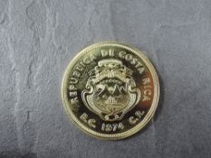 A 1974 Republic De Costa Rica American Central 1500 Colones Gold Coin, Giant Anteater to reverse,