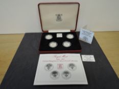 A Royal Mint 1984-1987 United Kingdom Four Coin £1 Silver Proof Collection, all in plastic