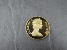 A 1978 Fiji 250 Dollars Gold Coin, Banded Iguana to reverse, Uncirculated in plastic capsule and