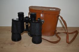 A Horizon Ambassador coated optic binocular, 10 x 50 field, to include a Philo brown leather carry