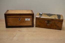 A 19th century satinwood tea caddy of rectangular form, having a rosewood border, hinged lid and