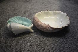 A giant ceramic Turners dish in the form for a sea clam, decorated having gold colour bird and