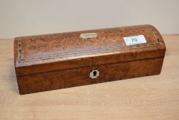 A Walnut pen box of domed form with parquetry and mother of pearl decoration having cloth lining