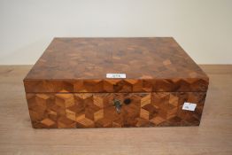 An attractive 19th century Geometric-parquetry jewellery box, the whole box banded in an arrangement
