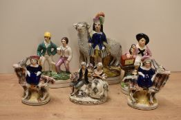 A late 19th Staffordshire pottery figure of large sheep with child, the sheep having docile face and