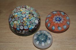 A vintage Milliefiori style paperweight, w8cm, sold together with two other Murano style