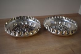 A pair of Walker & Hall silver plated dishes, embossed with grapes and foliage decoration, impressed