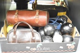 A box containing various bowling balls and carry bags, to include Temselite Crown King balls, a