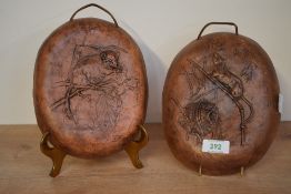 A pair of terracotta wall plaques, decorated having small harvest mouse, signed to base 'Limited