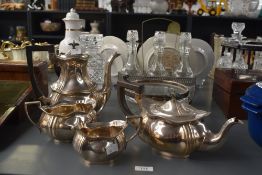 A part silver plated 4 piece tea set comprising of tea pot, coffee pot, milk jug and sugar bowl,
