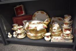 A large Royal Albert Old Country Roses pattern dinner service, decorated having gilt edging and