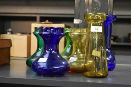 A group of blue, green and yellow bulb vases for Hyacinths and Amaryllis ect, largest h19.5cm.