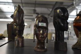 Three vintage ebony carved wood Africa sculptural figures, largest H25cm