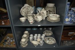 An extensive mid-century Indian Tree tea set, decorated with foliage on a white ground, factory